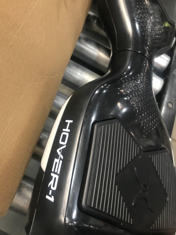Photo 1 of **PARTS ONLY**
Hover-1 Helix Electric Hoverboard Black  | 7MPH Top Speed, 4 Mile Range, 6HR Full-Charge, Built-in Bluetooth Speaker, Rider Modes: Beginner to Expert Hoverboard
