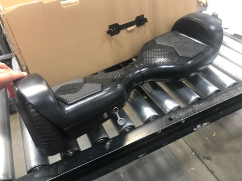 Photo 1 of **PARTS ONLY**
Hover-1 Helix Electric Hoverboard Black  | 7MPH Top Speed, 4 Mile Range, 6HR Full-Charge, Built-in Bluetooth Speaker, Rider Modes: Beginner to Expert Hoverboard