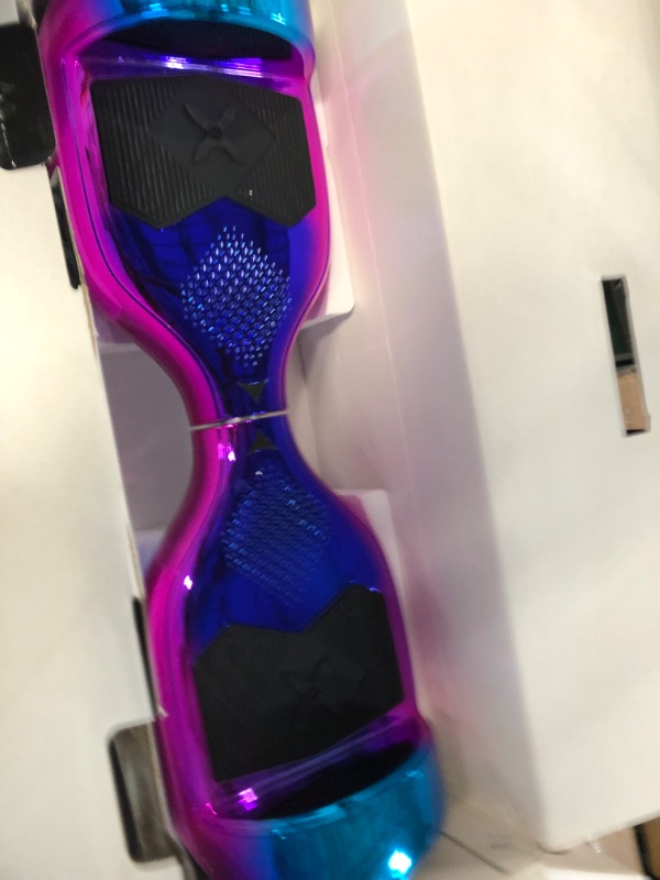 Photo 2 of **SEE NOTES**
Hover-1 Helix Electric Hoverboard | 7MPH Top Speed, 4 Mile Range, 6HR Full-Charge, Built-in Bluetooth Speaker, Rider Modes: Beginner to Expert Hoverboard Iridescent