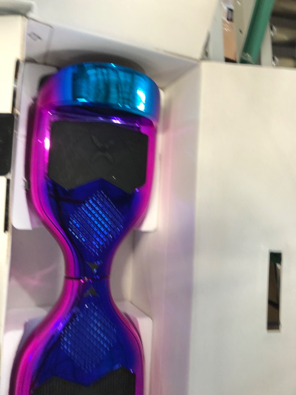 Photo 4 of **SEE NOTES**
Hover-1 Helix Electric Hoverboard | 7MPH Top Speed, 4 Mile Range, 6HR Full-Charge, Built-in Bluetooth Speaker, Rider Modes: Beginner to Expert Hoverboard Iridescent