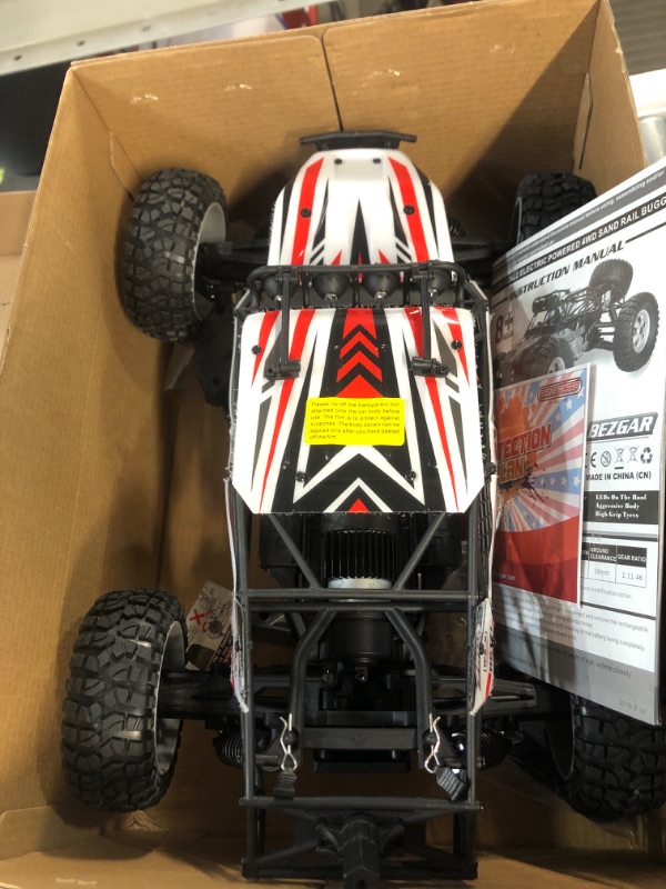 Photo 2 of BEZGAR HB121 Hobby Grade 1:12 Scale RC Trucks, 4WD High Speed 45 Km/h All Terrains Electric Toy Off Road Sand Rall Buggy RC Truck RC Monster Car with Rechargeable Batteries for Boys Kids and Adults White.