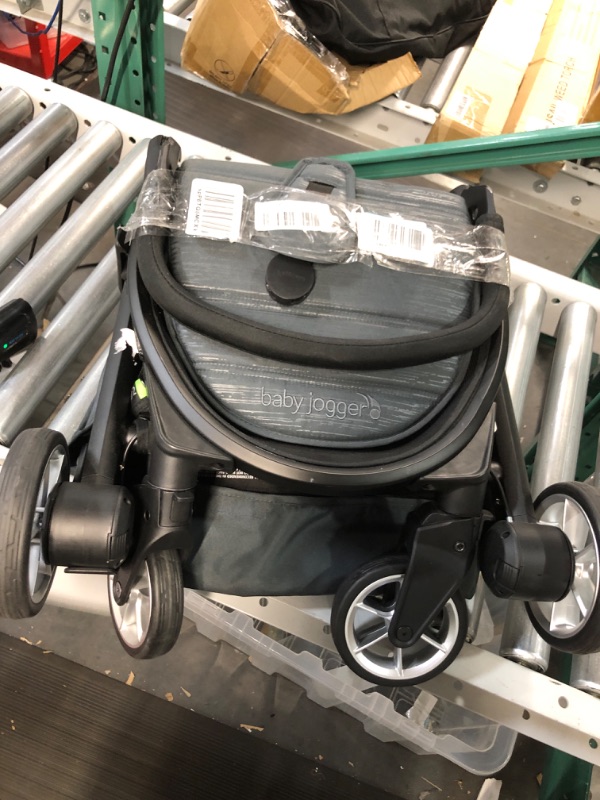 Photo 2 of Evenflo Gold Pivot Xpand Travel System Securemax Onyx - Black, (STROLLER ONLY) 