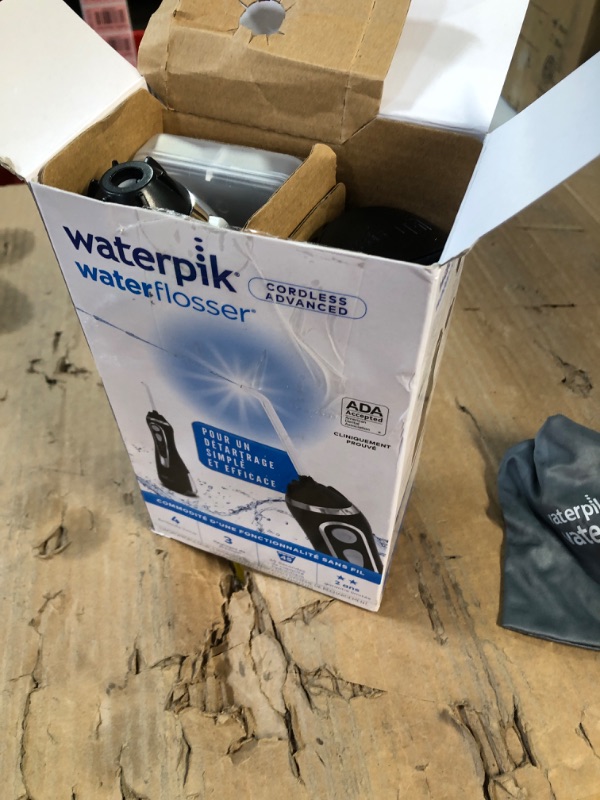 Photo 2 of * USED * 
Waterpik Cordless Advanced Water Flosser For Teeth, Gums, Braces, Dental Care With Travel Bag and 4 Tips, ADA Accepted, Rechargeable, Portable, and Waterproof, Black WP-562