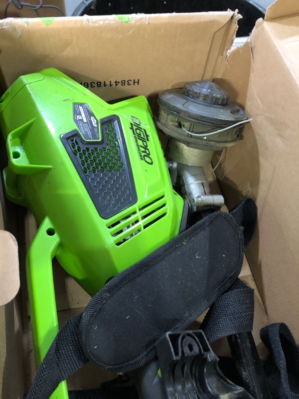 Photo 2 of * USED * HEAVILY * 
Greenworks G-Max 40V DigiPro 14 in. String Trimmer - 2100202