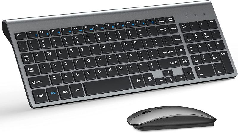 Photo 1 of Wireless Keyboard and Mouse Ultra Slim Combo, TopMate 2.4G Silent Compact USB 2400DPI Mouse and Scissor Switch Keyboard Set with Cover, 2 AA and 2 AAA Batteries, for PC/Laptop/Windows - Gold Black Gold Black 2400DPI