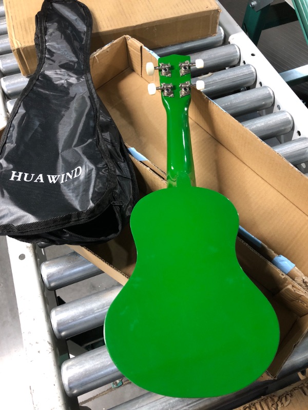 Photo 3 of *GENTLY USED* HUAWIND Kids Ukulele, 21 inch Soprano Ukulele, Four String Wood Uke with Gig Bag (Green) 