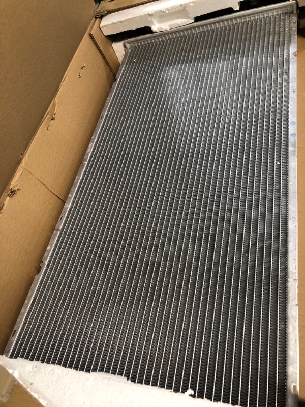 Photo 2 of Spectra Premium CU2423 Complete Radiator With TOC, Without EOC - 34-1/16" Core