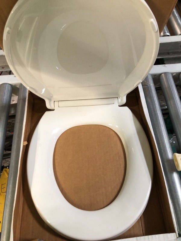 Photo 3 of [Used] KOHLER Stonewood® Quiet-Close™ Round-front, Slow-Close - White 
