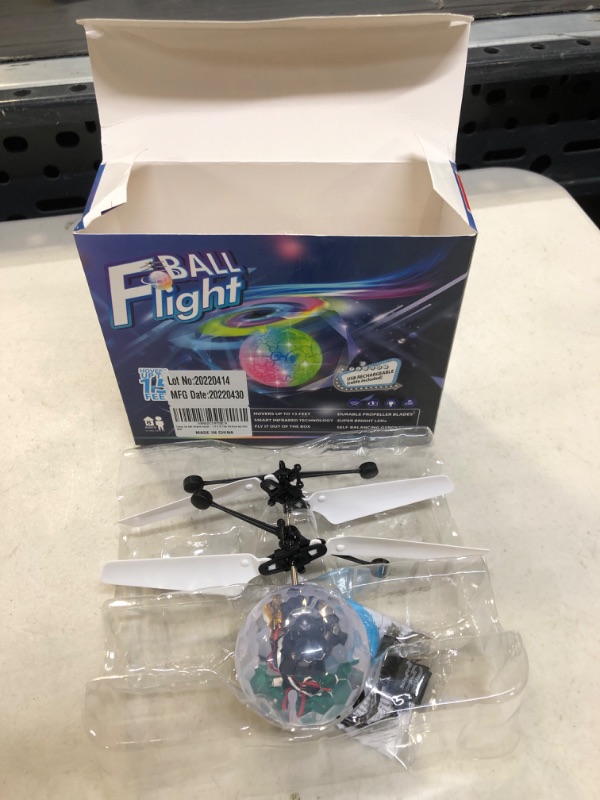 Photo 2 of Flying Toy Ball Infrared Induction RC Flying Toy Built-in LED Light Disco Helicopter Shining Colorful Flying Drone Indoor and Outdoor Games Toys for 3 4 5 6 7 8 9 10 Year Old Boys and Girls