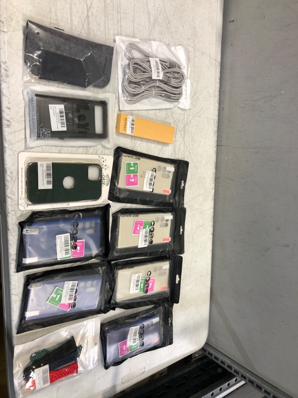 Photo 1 of Assortment of cases, watch bands, and chargers