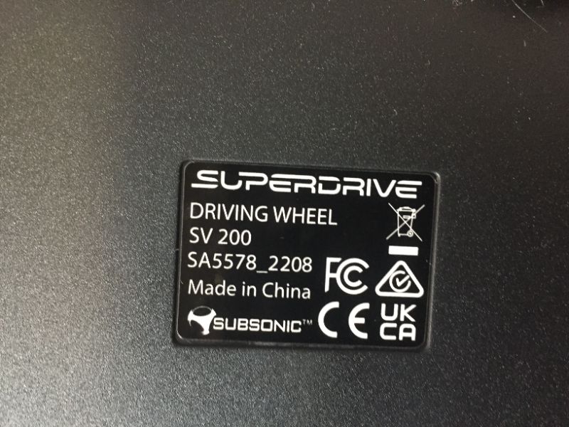 Photo 4 of Superdrive - racing Driving Wheel with pedals and gearshift paddles for Nintendo Switch - Ps4 - Xbox One - PC - Ps3 - ITEM IS DIRTY AND HAS SOME SCRATHCES FROM USE -