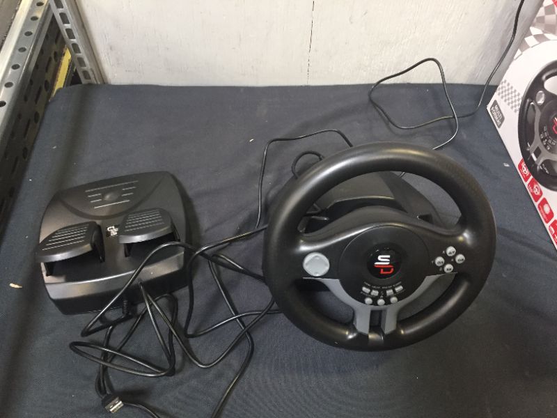 Photo 2 of Superdrive - racing Driving Wheel with pedals and gearshift paddles for Nintendo Switch - Ps4 - Xbox One - PC - Ps3 - ITEM IS DIRTY AND HAS SOME SCRATHCES FROM USE -