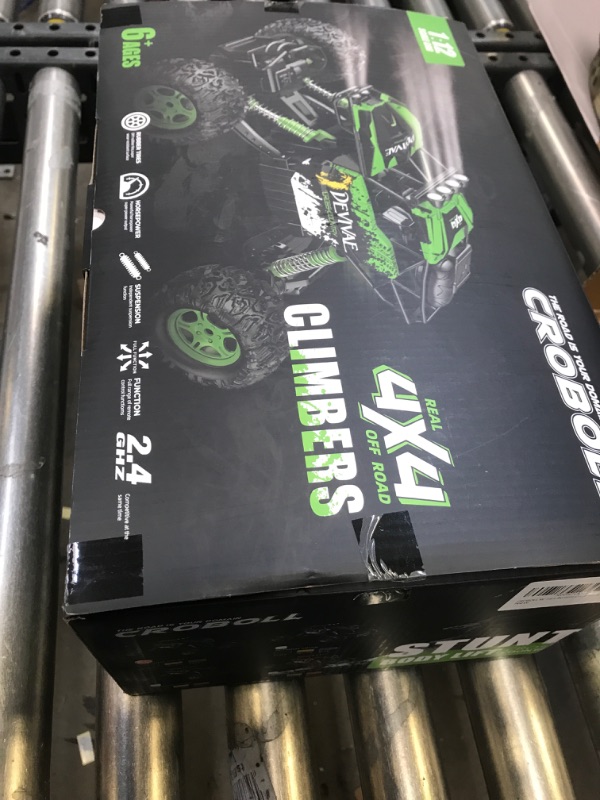 Photo 2 of CROBOLL 1:12 Large Remote Control Car for Boys with Upgraded Lifting Function, 4WD 20km/h RC Car Toys for Kids 4X4 Off-Road RC Rock Crawler, 2.4GHz All Terrain RC Monster Truck for 60Mins Play(Green)