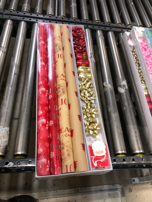 Photo 2 of (Pack of 2) Wrapping Paper, 4 Rolls of Red Christmas Birthday Wrapping Paper. Includes Christmas Tree, Snowflake, Merry Christmas, HO HO HO Elements. Includes Decorative Flowers, Ribbons, Labels. Each Roll of Gift Wrap Paper ,easures 27.5 In X 13 ft