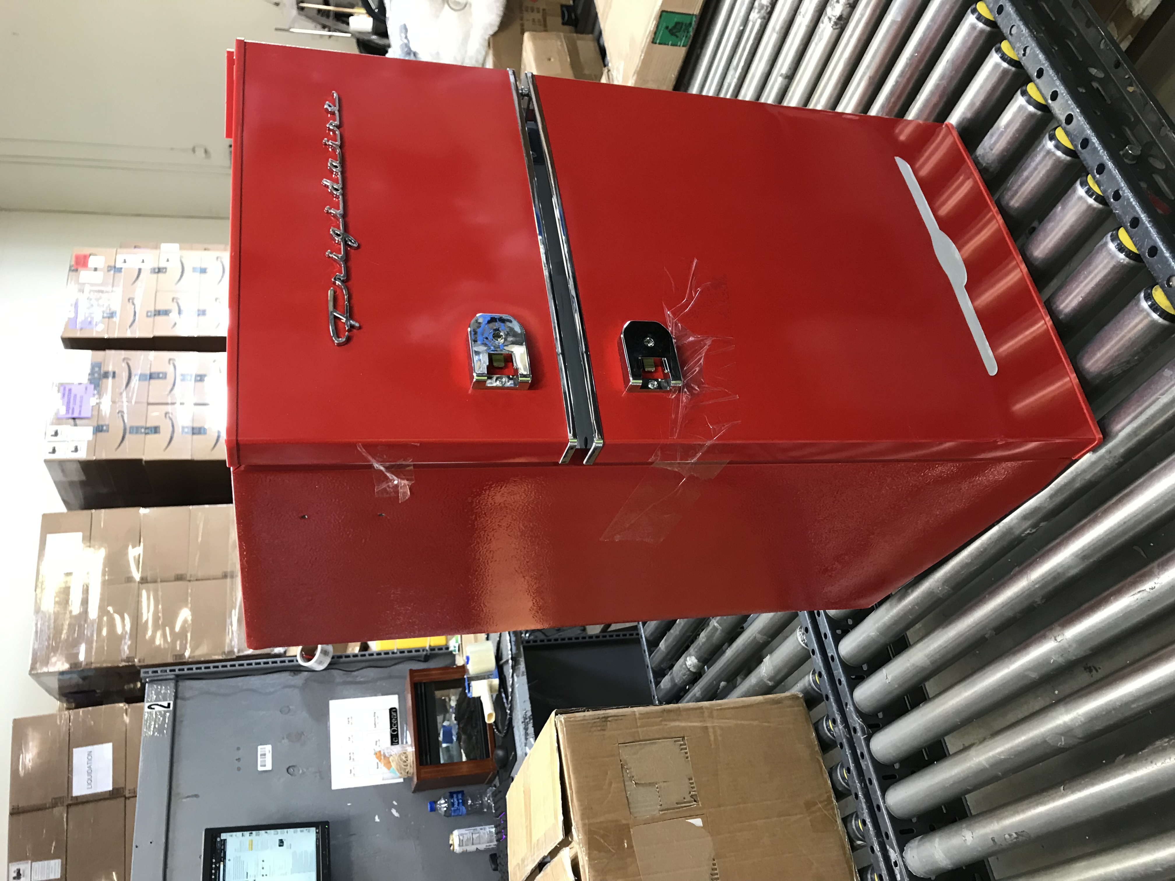 Photo 5 of Frigidaire EFR840-RED 3.1 Cu Ft Red 2 Door Retro Bar Fridge with Side Bottle Opener missing side bottle opener ---minor dents 
