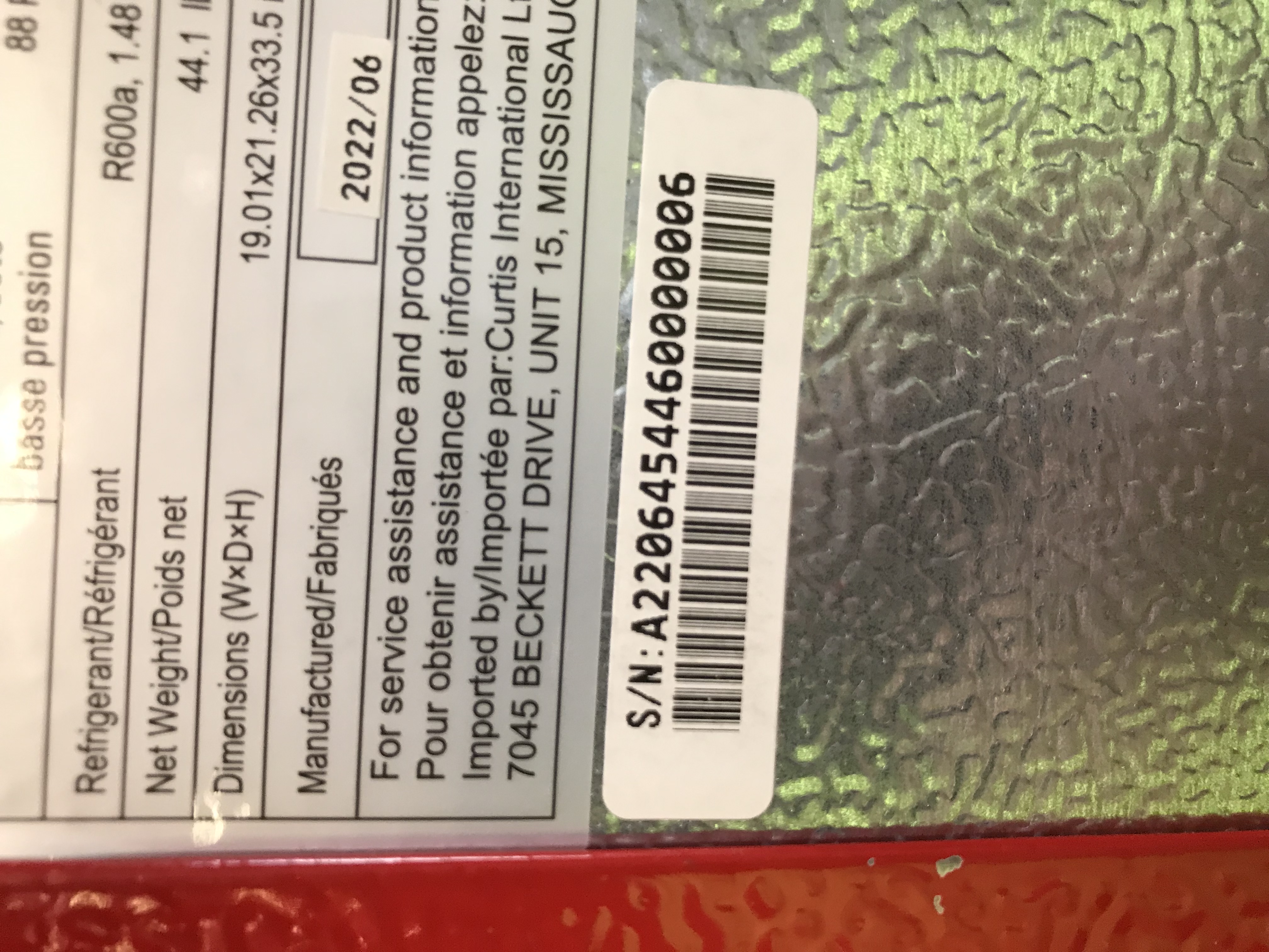 Photo 6 of Frigidaire EFR840-RED 3.1 Cu Ft Red 2 Door Retro Bar Fridge with Side Bottle Opener missing side bottle opener ---minor dents 
