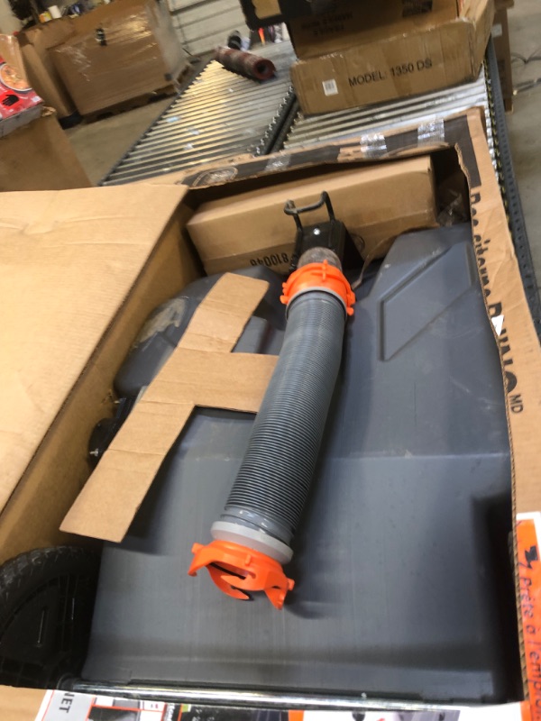 Photo 1 of Camco Rhino Portable RV Waste Holding Tank with Hose and Accessories, 28 Gallons (39004) , Gray----THERE IS MUD ON THE ITEM 