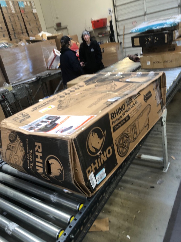 Photo 1 of Camco Rhino Portable RV Waste Holding Tank with Hose and Accessories, 28 Gallons (39004) , Gray----THERE IS MUD ON THE ITEM 