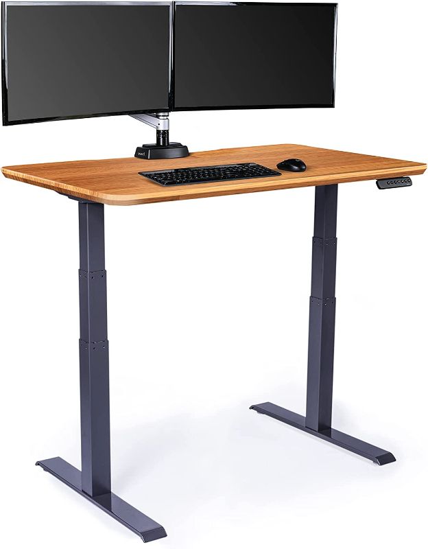 Photo 1 of  Electric Standing Desk 60" x 30" (VariDesk) - Electric Height Adjustable Desk - Standing Desk for Office or Home - Adjustable Standing Desk - Powerful Dual Motor Sit Stand Desk - Butcher Block----sale for parts 