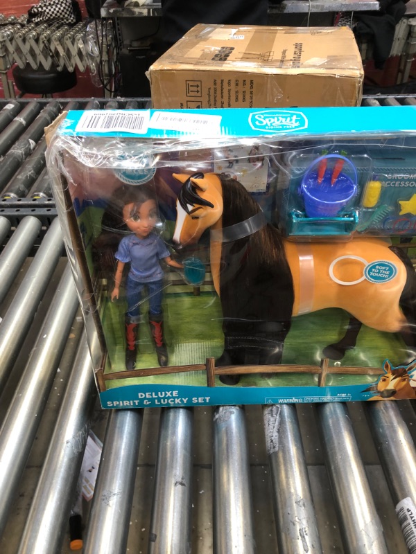 Photo 4 of DreamWorks Spirit Riding Free Deluxe 14 Inch Spirit Horse and 11.5 Inch Lucky Doll Set with Accessories, by Just Play