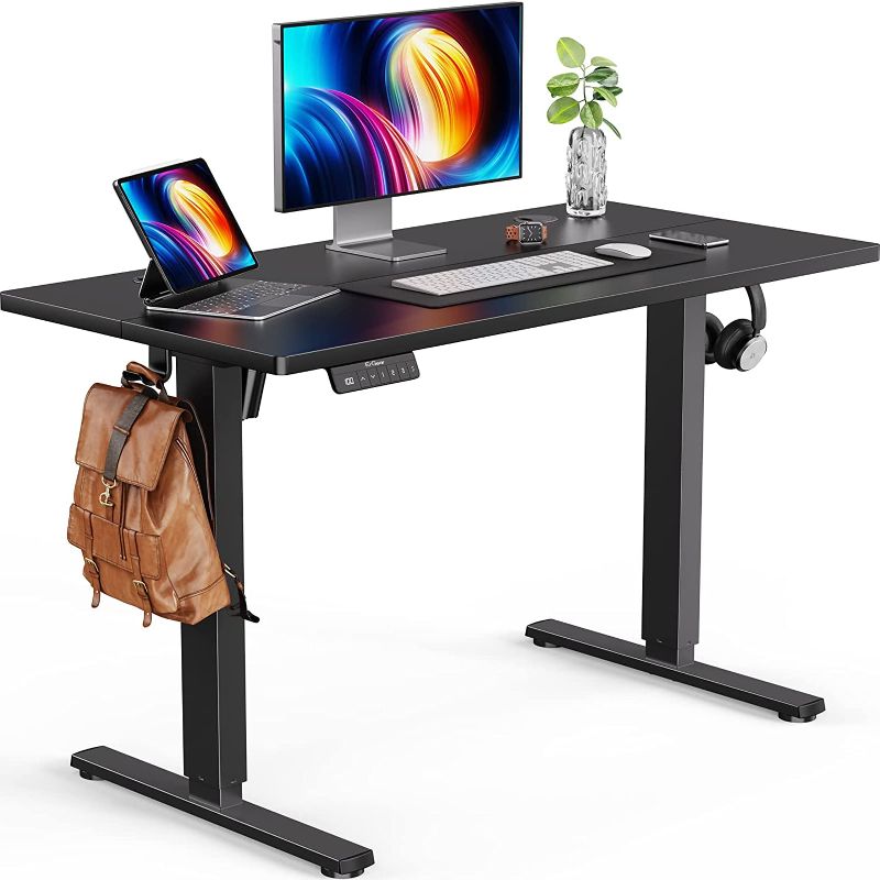 Photo 1 of ErGear Electric Standing Desk 48 x 24 Inches, Height Adjustable Sit Stand up Desk with Wheels, Memory Computer Workstation Table with Splice Board for Home Office, Black
