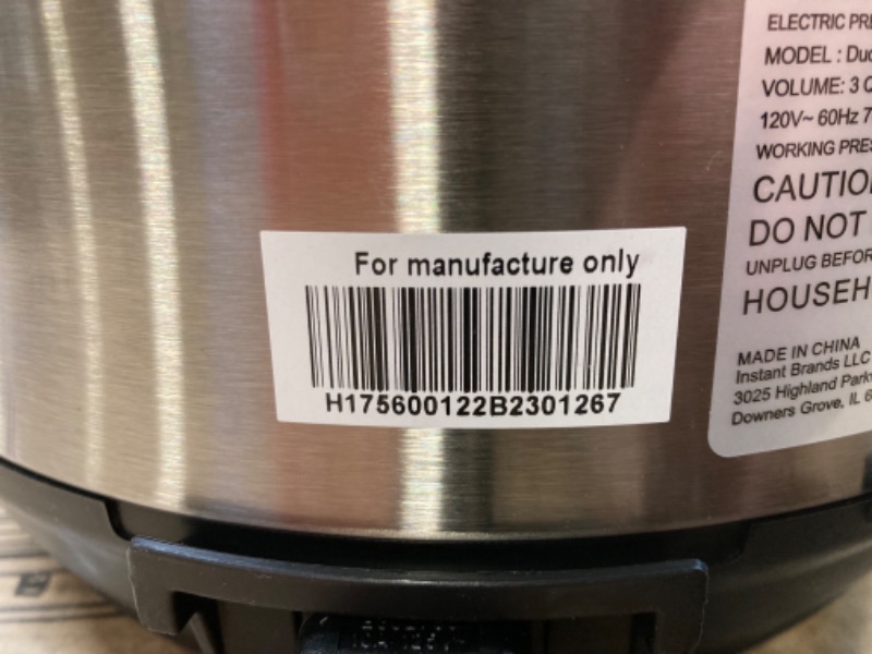 Photo 3 of Instant Pot Duo 7-in-1 Electric Pressure Cooker, DENTED 