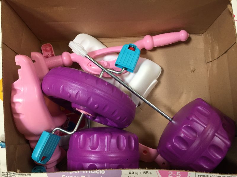 Photo 1 of Fisher-Price Barbie Tough Trike, Toddler Ride-On Toy Tricycle With Storage Compartment  *** BOX DAMAGE ***
