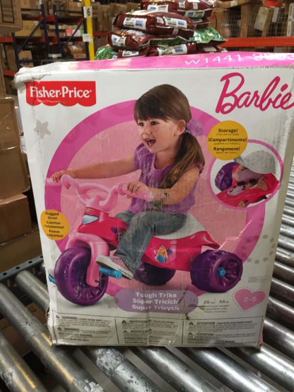 Photo 4 of Fisher-Price Barbie Tough Trike, Toddler Ride-On Toy Tricycle With Storage Compartment  *** BOX DAMAGE ***