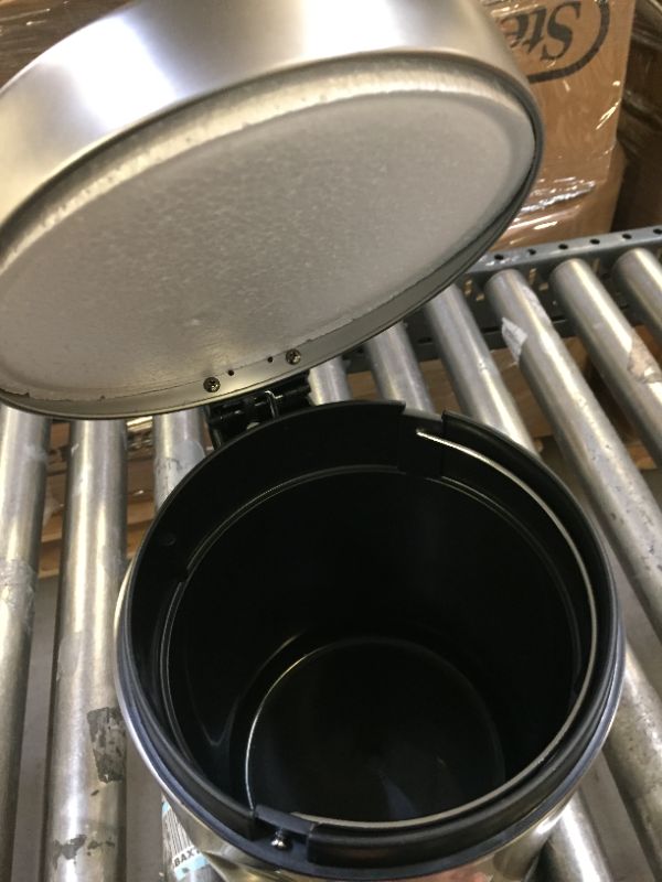 Photo 1 of Amazon Basics 5 Liter / 1.3 Gallon Round Soft-Close Trash Can with Foot Pedal *** ITEM HAS A DENT ON THE SIDE ***