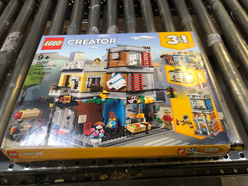 Photo 3 of LEGO Creator 3 in 1 Townhouse Pet Shop & Café 31097 Toy Store Building Set with Bank, Town Playset with a Toy Tram, Animal Figures and Minifigures (969 Pieces) Standard Packaging