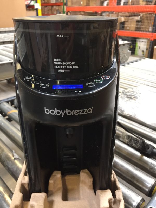 Photo 2 of Baby Brezza Formula Pro Mini Baby Formula Maker – Small Baby Formula Mixer Machine Fits Small Spaces  *** ITEM HAS DEBRIS FROM PRIOR USE ***