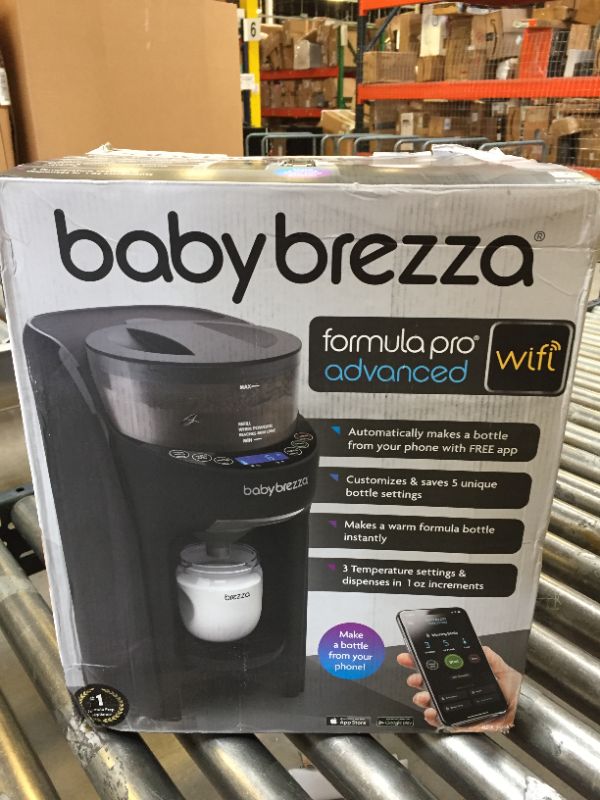 Photo 4 of Baby Brezza Formula Pro Mini Baby Formula Maker – Small Baby Formula Mixer Machine Fits Small Spaces  *** ITEM HAS DEBRIS FROM PRIOR USE ***