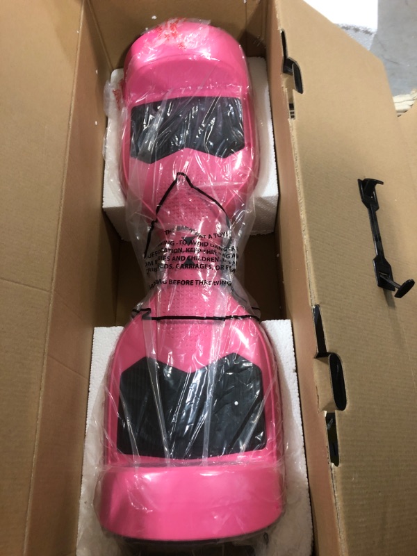 Photo 2 of Hover-1 i-200 Electric Hoverboard | 7MPH Top Speed, 6 Mile Range, 6HR Full-Charge, Built-in Bluetooth Speaker, Rider Modes: Beginner to Expert, Pink