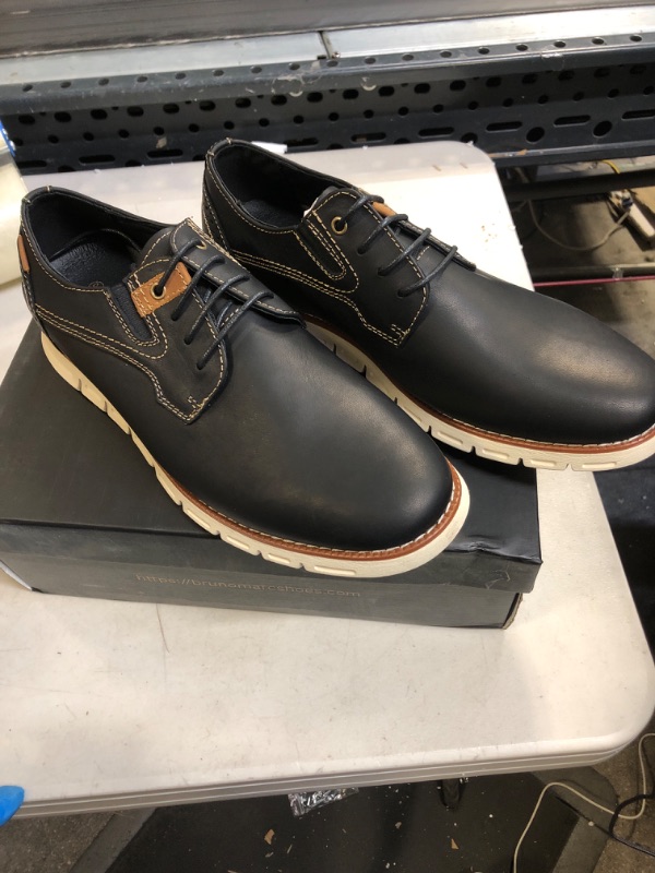 Photo 1 of MENS 9.5 BLUE SNEAKER