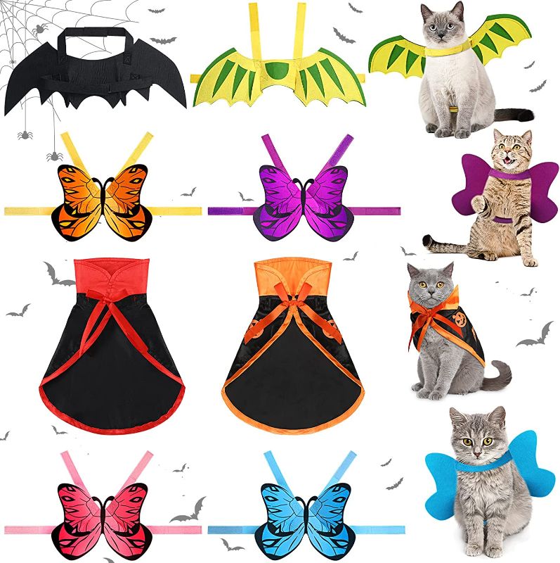 Photo 1 of 8 Pieces Halloween Pet Costume Set Includes 4 Colorful Cat Dog Butterfly Wings 1 Bat Wings 1 Dinosaur Wings 1 Vampire Cloak 1 Pumpkin Cape for Halloween Party Decoration Cosplay Dress up Accessories