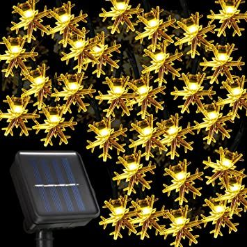 Photo 1 of 30 LED Solar Snowflake Lights Christmas String Lights 21.3 Feet Waterproof 8 Modes Solar Powered Fairy Lights for Wedding Party Garden Bedroom Outdoor Indoor Christmas Decoration (Warm Ligh