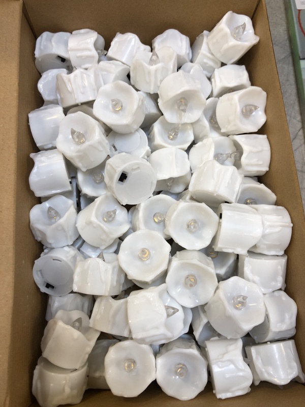 Photo 2 of 100 Pcs Flameless Tea Lights Candles LED Votive Candles Flickering Flameless Candles Warm White Light Battery Operated Candles for Wedding, Valentine's Day, Halloween, Christmas Party Decoration