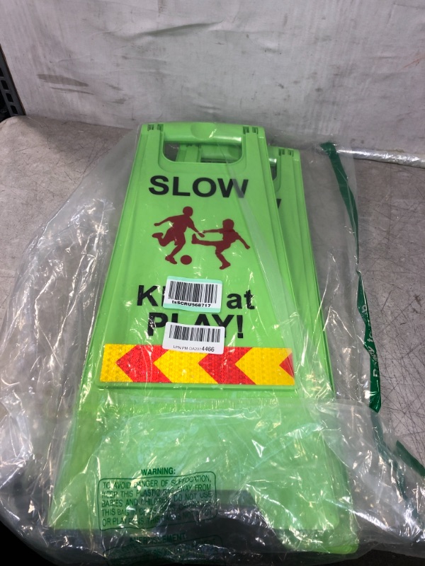 Photo 2 of Children at Play Safety Signs, 2 Pack Kids at Play Signs with Reflective Tape, Double-Sided Text and Graphics Easier to Identify, Kids at Play and Slow Down Signs for Street Neighborhoods Schools Park Sidewalk Driveway( Green) 2 Pack Green