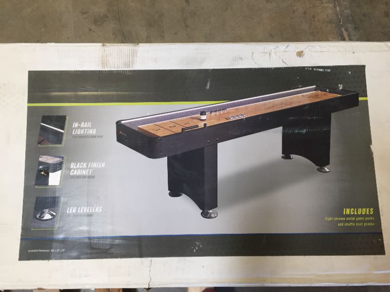 Photo 1 of Atomic 9’ LED Shuffleboard Tables with Poly-Coated Playing Surface for Smooth, Fast Puck Action and Pedestal Legs with Levelers for Optimum Stability and Level Play  *** BOX DAMAGE ***
