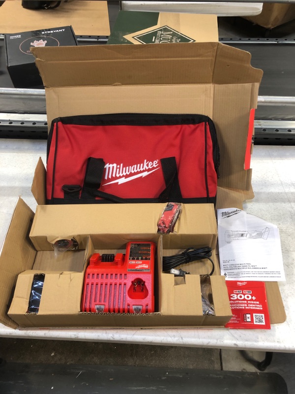 Photo 2 of Milwaukee 2626-21CP M18 18-Volt Lithium-Ion Cordless Oscillating Multi-Tool Kit