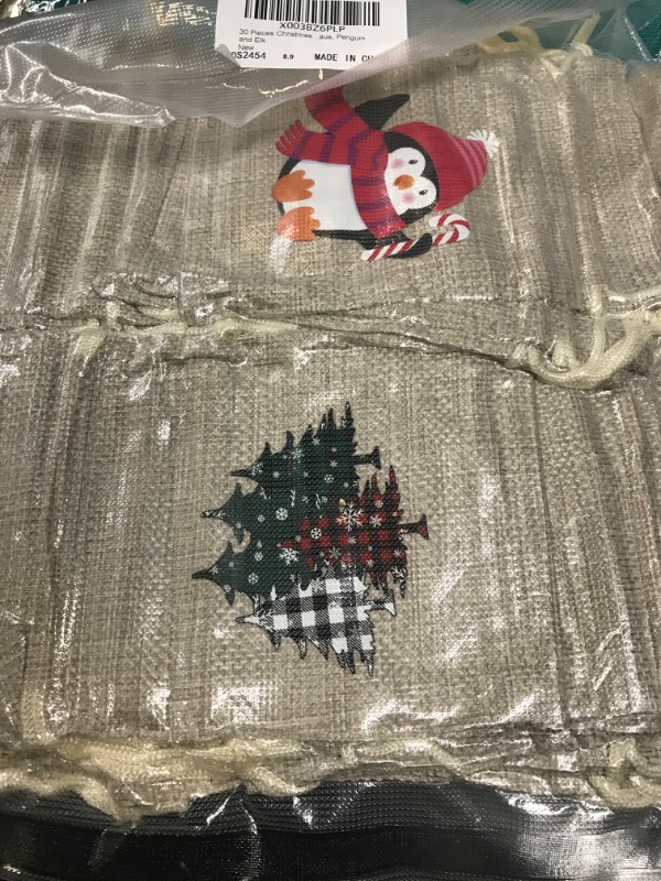 Photo 2 of 30 Pieces Christmas Jute Burlap Bags Christmas Gifts Drawstring Bags Xmas Candy Bag Canvas Craft Goodie Bags for Christmas DIY Craft Xmas Party, 30 designs Snowman, Santa Claus, Penguin and Elk