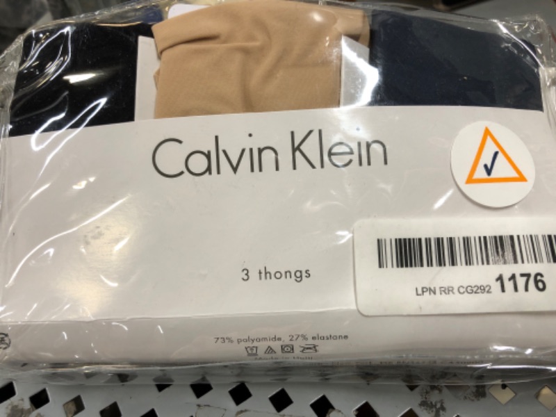 Photo 2 of Calvin Klein Women’s Invisibles Seamless Thong Panties, Multipack Medium Speakeasy, Light Caramel, Black