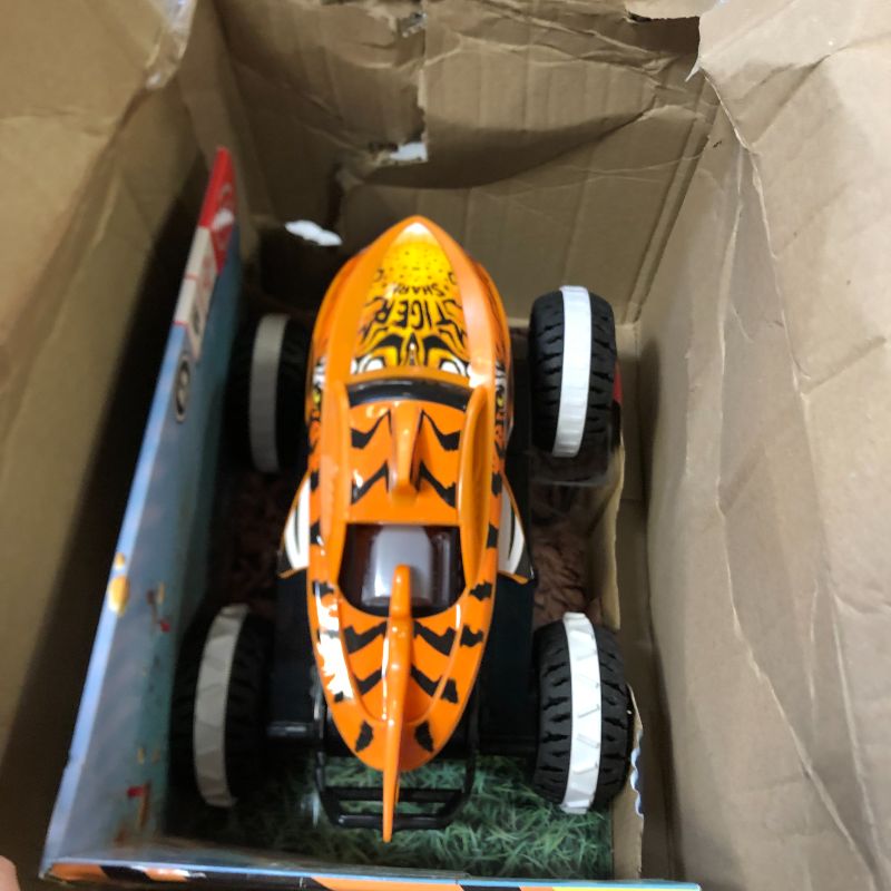 Photo 2 of Hot Wheels Monster Trucks, Remote Control Car, Monster Truck Toy with All-Terrain Wheels, 1:15 Scale Unstoppable Tiger Shark RC