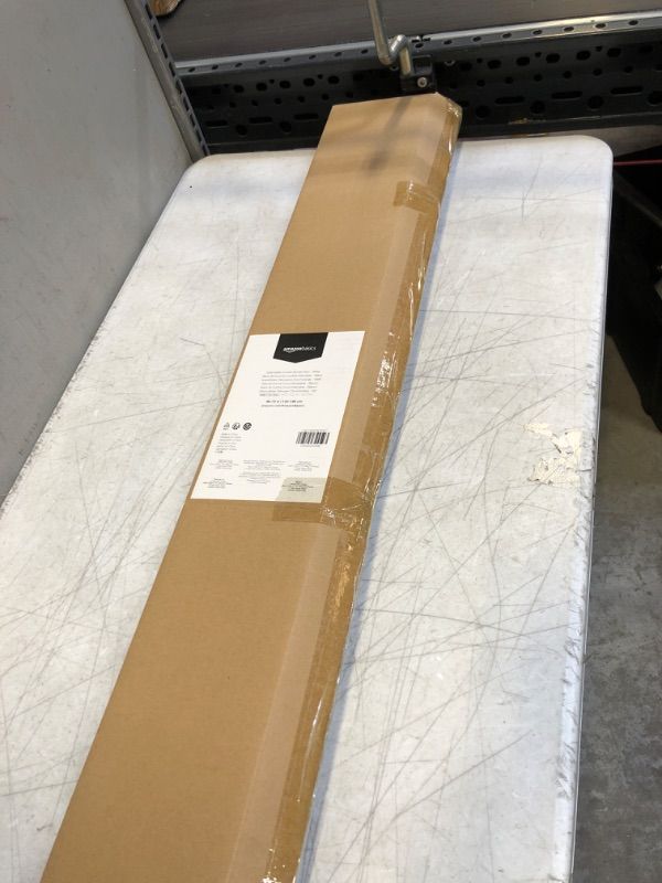 Photo 2 of Amazon Basics Extendable Curved Shower Rod - 48" to 72", White