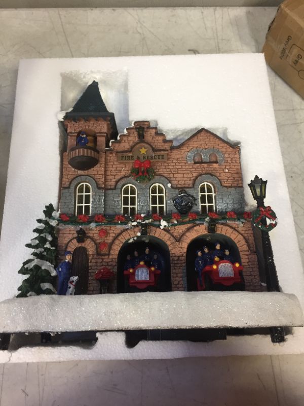 Photo 2 of Moments In Time Christmas Village Building, Fire Station with LED Lights, Christmas Music, and Animation - Power Adapter (Included) (12.0" H x 10.0" W x 6.9" D)