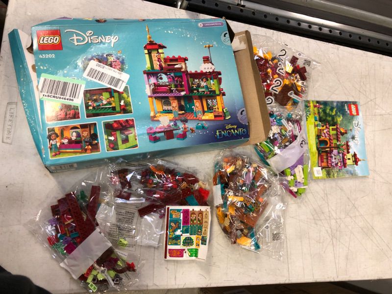 Photo 2 of LEGO Disney Encanto The Madrigal House 43202 Building Kit; A for Kids Who Love Construction Toys and House Play (587 Pieces) / PACKAGING HAS MINIMAL DAMAHGE 