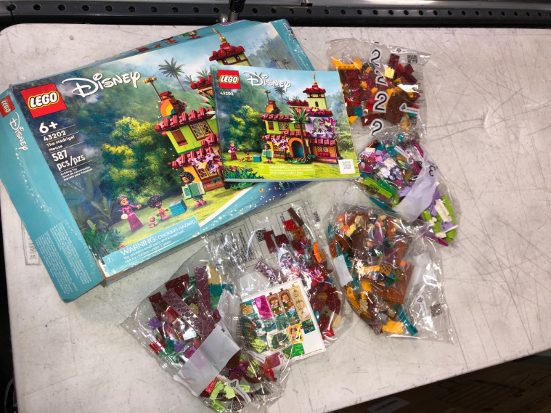 Photo 3 of LEGO Disney Encanto The Madrigal House 43202 Building Kit; A for Kids Who Love Construction Toys and House Play (587 Pieces) / PACKAGING HAS MINIMAL DAMAHGE 