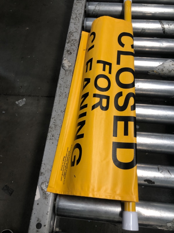 Photo 2 of Rubbermaid Commercial Extend-to-Fit "Closed For Cleaning" Hanging Doorway Safety Sign, Yellow (FG9S1500YEL) English Only