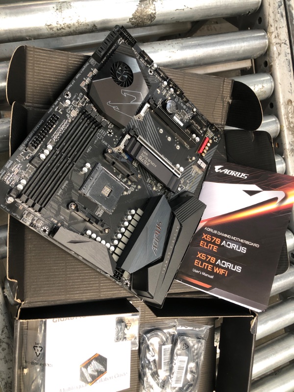 Photo 2 of **DAMAGED** 
GIGABYTE X570 AORUS Elite Wi-Fi (AMD Ryzen 3000/X570/ATX/PCIe4.0/DDR4/Intel Dual Band 802.11AC  Thermal Guard/Gaming Motherboard) 