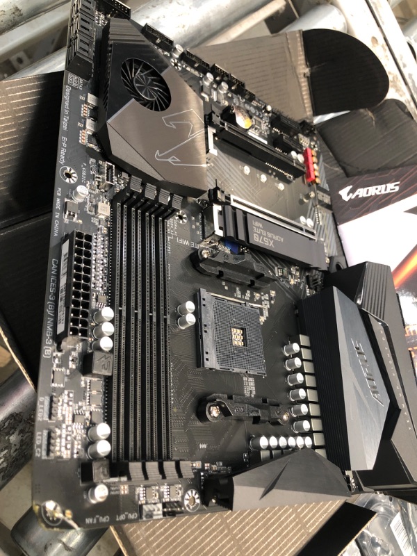 Photo 3 of **DAMAGED** 
GIGABYTE X570 AORUS Elite Wi-Fi (AMD Ryzen 3000/X570/ATX/PCIe4.0/DDR4/Intel Dual Band 802.11AC  Thermal Guard/Gaming Motherboard) 